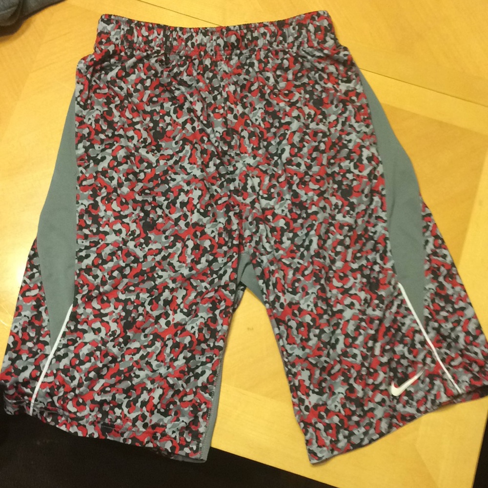 Red grey and black Nike shorts